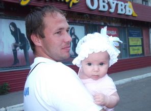 У папы на ручках