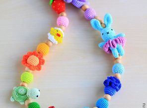 d9c14087981-raboty-dlya-detej-slingobusy-raznotsvetnye-amigurushki-n2016