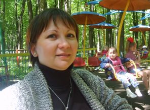 А это я и дочь на карусели