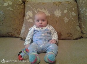 Никитёнок, 3 месяца весит 7 кг и носим одежду 68-74))))